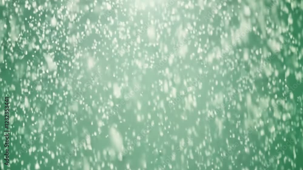 Gentle snowfall effect on soft green background Gentle snowfall effect on soft green background
