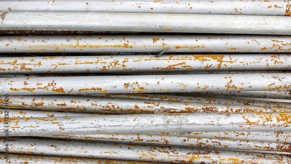 Pipes used for fastening wooden beams in concrete construction. Pipes of support formwork. Metal supports for scaffolding and formwork. Building Pipes used for fastening wooden beams in concrete construction. Pipes of support formwork. Metal supports for scaffolding and formwork. Building