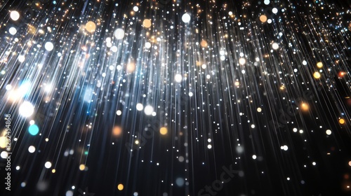 Dynamic display of shimmering particles and light effects in a dark environment photo