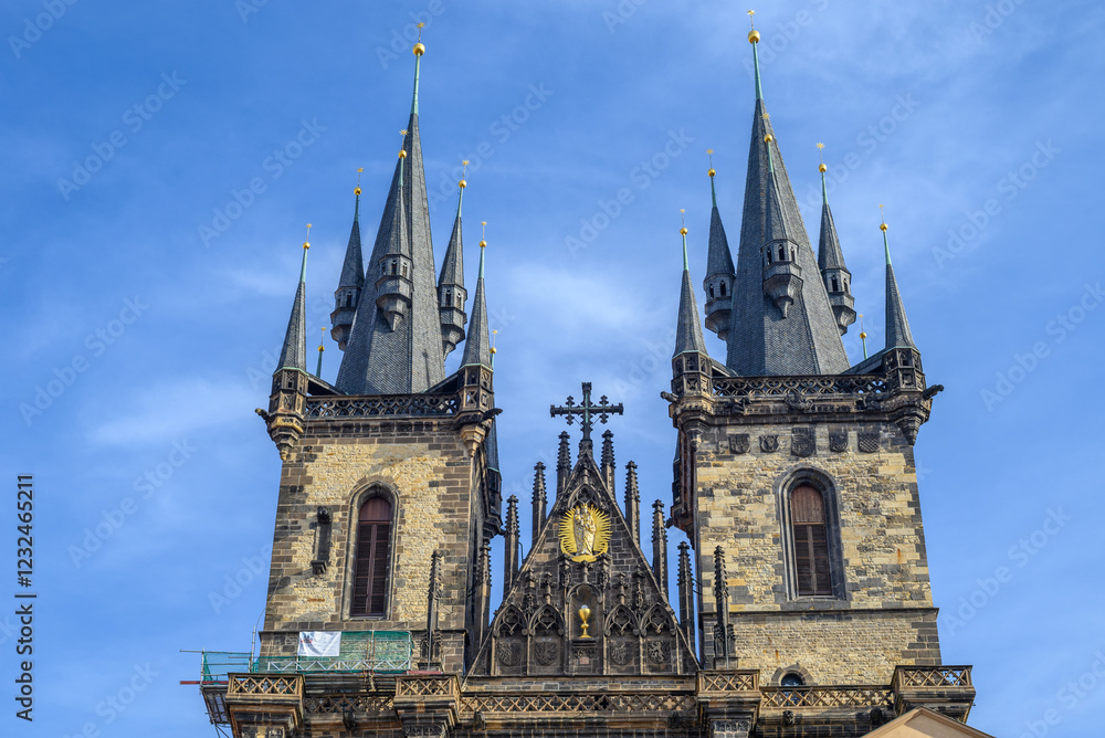 Fototapeta premium Towers of gothic Church of the Mother of God before Tyn, at the Old Town square in Prague, capital of Czech Republic