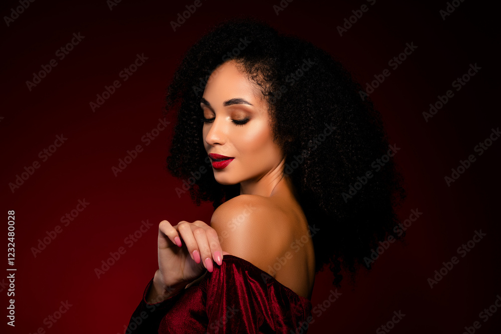 Fototapeta premium Tempting pretty girl touch her satin textile dress enjoying soft silky texture on gradient background