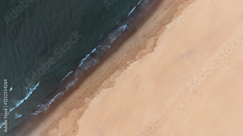 drone footage of a sandy beach shoreline in County Wexford, Ireland