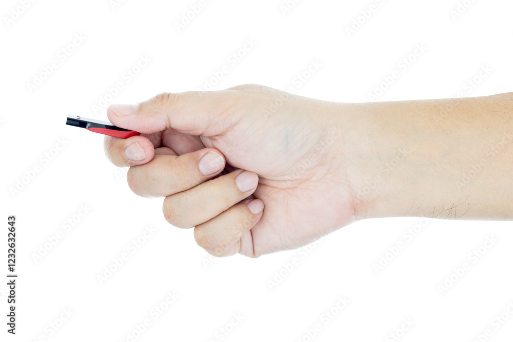 A hand holding a USB flash drive, isolated on a white background with a clipping path. A hand holding a USB flash drive, isolated on a white background with a clipping path.