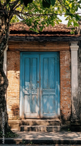 A closed building door. The door is called Gebyok. Gebyok is one of the typical Javanese furniture in the form of a Javanese partition, which is generally made of teak wood. photo