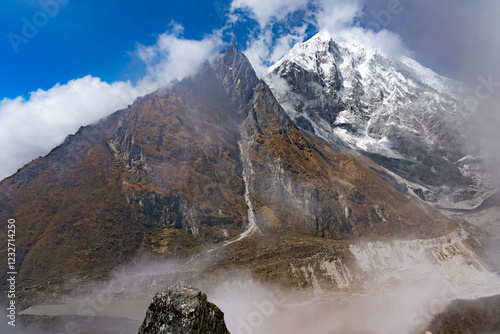 Very Cloudy Himalayan Mountain of  Langtang Lirung Peak in Kyanjin Ri Gompa Trekking Nepal photo