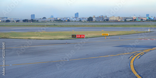 sign markings on taxiway for plane direction in taxiway at international airport.