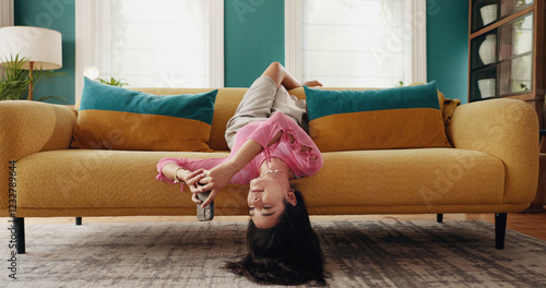 Fotografía Phone, upside down and woman relax in home, reading text and post on social media profile online