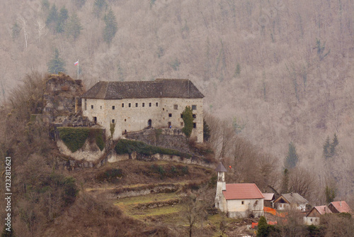 Kostel castle with Kostel church above the Kolpa valley in Slovenia in Europe