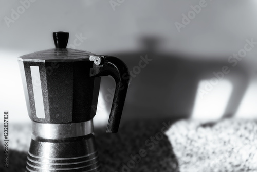 Canvas Print Coffee percolator in light and shadows