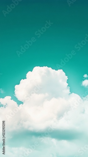 Beautiful cloud floating over calm ocean waters under a clear blue sky