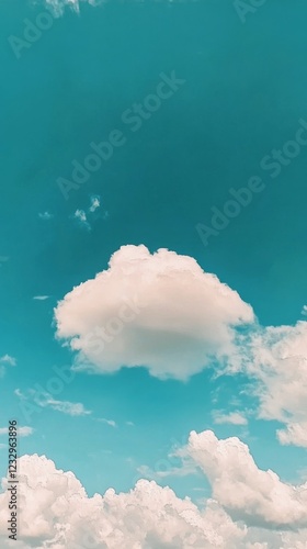 Beautiful cloud floating over calm ocean waters under a clear blue sky