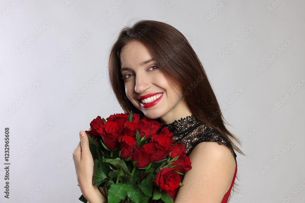 Happy Valentine's Day. Beautiful woman with bouquet of roses on white background Happy Valentine's Day. Beautiful woman with bouquet of roses on white background