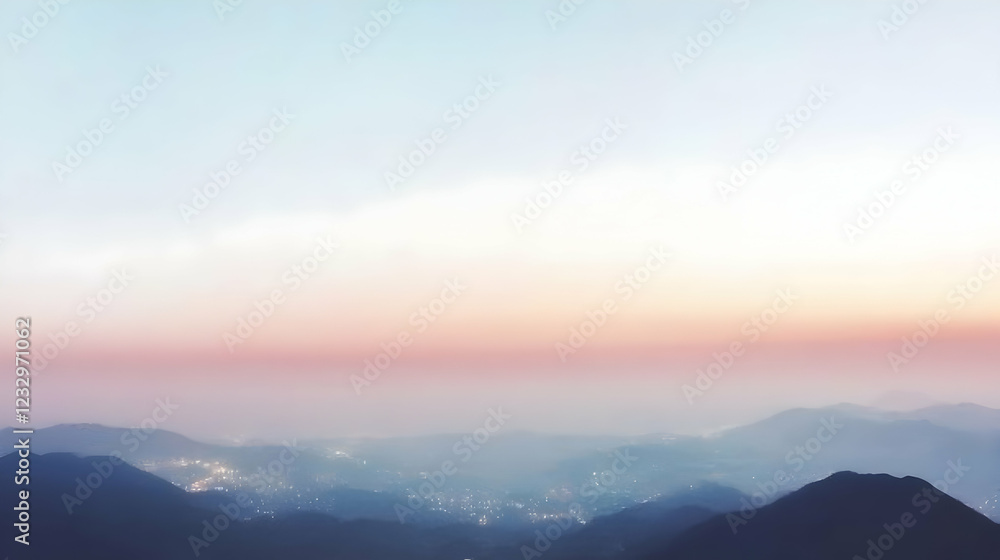 Fototapeta premium Serene sunset over misty mountain range with city lights.