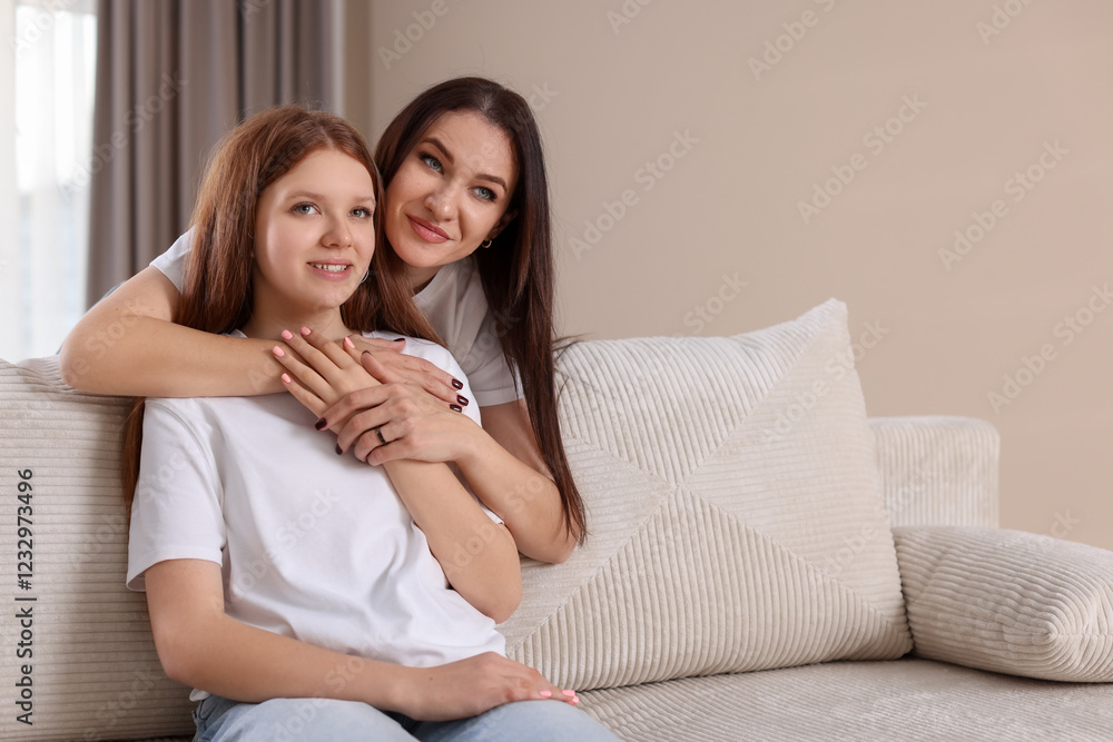 Portrait of beautiful mother with teenage daughter at home Portrait of beautiful mother with teenage daughter at home