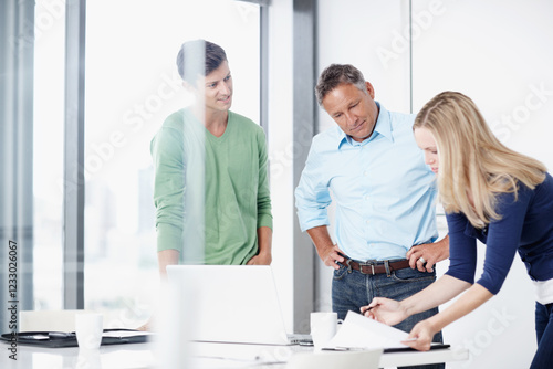 Business people, planning or documents in meeting for budget feedback, research or internship. Paperwork, mature procurement manager or teamwork at startup for mentorship advice or project management