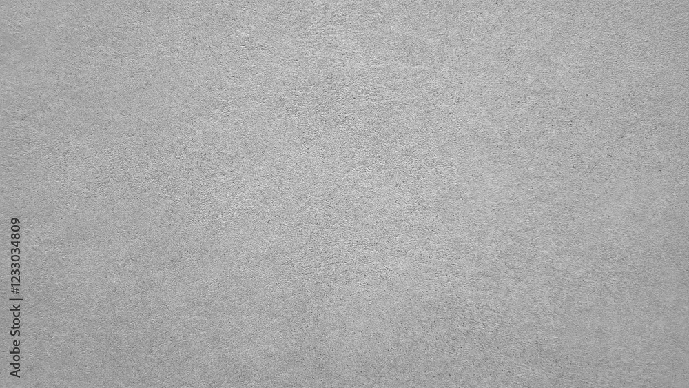 A grey background with no visible objects A grey background with no visible objects