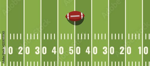 soccer ball standing near the center line on the green field