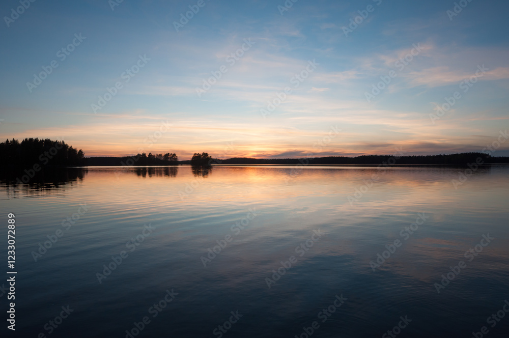 A scenic lake view in the forests of Finland in spring time A scenic lake view in the forests of Finland in spring time
