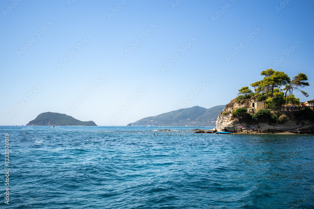 Idyllic Scenery of Cameo Island in Zakynthos. European Summer Destionation during Sunny Day. Beautiful Landscape of Ionian Sea and Nature in Greece. Idyllic Scenery of Cameo Island in Zakynthos. European Summer Destionation during Sunny Day. Beautiful Landscape of Ionian Sea and Nature in Greece.