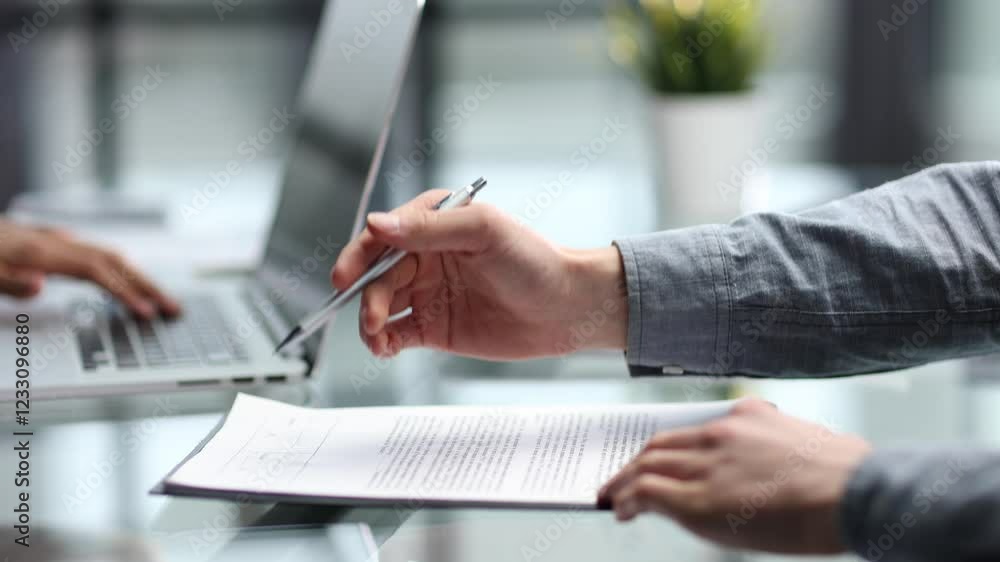 Working with documents at the desk in close-up in the office Working with documents at the desk in close-up in the office