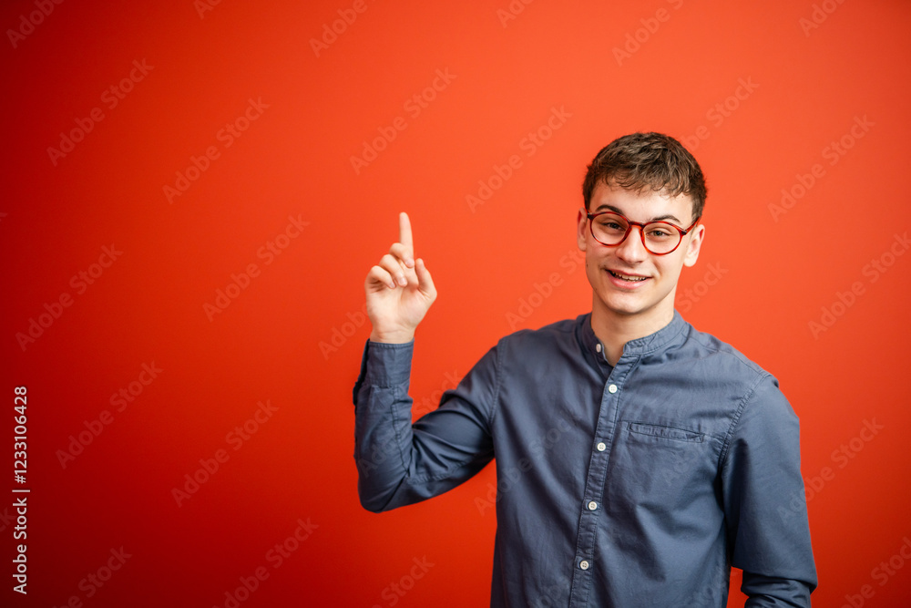 portrait of man stand and show red background behind him studio shot portrait of man stand and show red background behind him studio shot