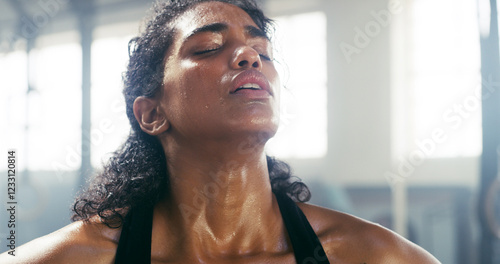 Tableau sur toile Fitness, fatigue and woman sweating in gym on break for intense workout, exercise recovery or breathing