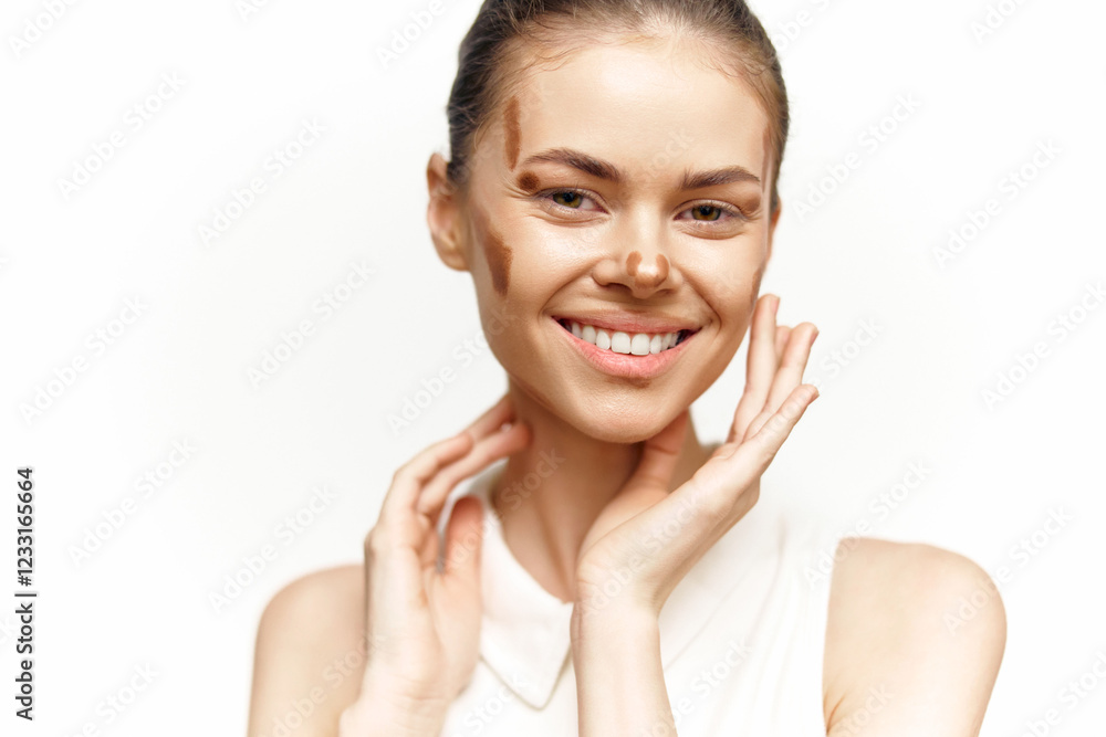 Joyful woman with a natural smile and artistic facial makeup, showcasing beauty and creativity. Joyful woman with a natural smile and artistic facial makeup, showcasing beauty and creativity.