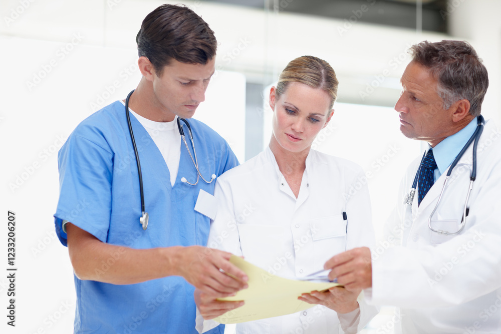 Doctors, research and files with people in hospital for patient treatment plan, consulting and healthcare. Diagnostic advice, medical intern and nurse with men and woman in clinic for test results Doctors, research and files with people in hospital for patient treatment plan, consulting and healthcare. Diagnostic advice, medical intern and nurse with men and woman in clinic for test results