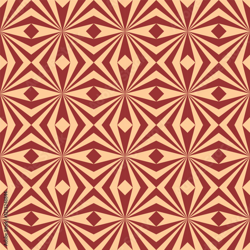 A visually dynamic seamless pattern featuring a repeating geometric design in warm, earthy tones of red and orange
