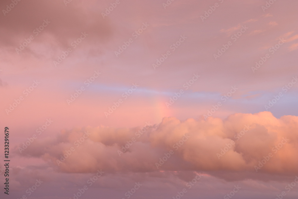 Obraz premium Rainbow and clouds in the sky