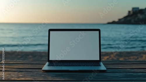 Laptop with blank screen on table with beach background