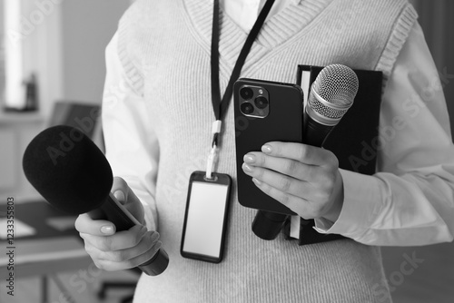 Schilderij op canvas Journalist with microphones, mobile phone and notebook, closeup