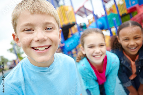 Happy kids, boy and portrait in playground on outdoor holiday or vacation with smile or fun weekend. Growth development, friends and group of excited children for adventure, joy and wellness in park