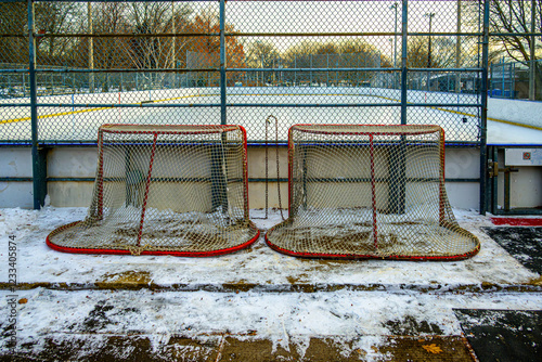 Canvas Print hockey nets outside an outdoor hockey rink early in the morning shot at kew gard