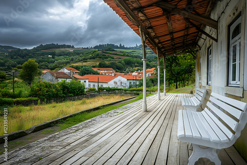 Serene Village Vista from a Train Platform