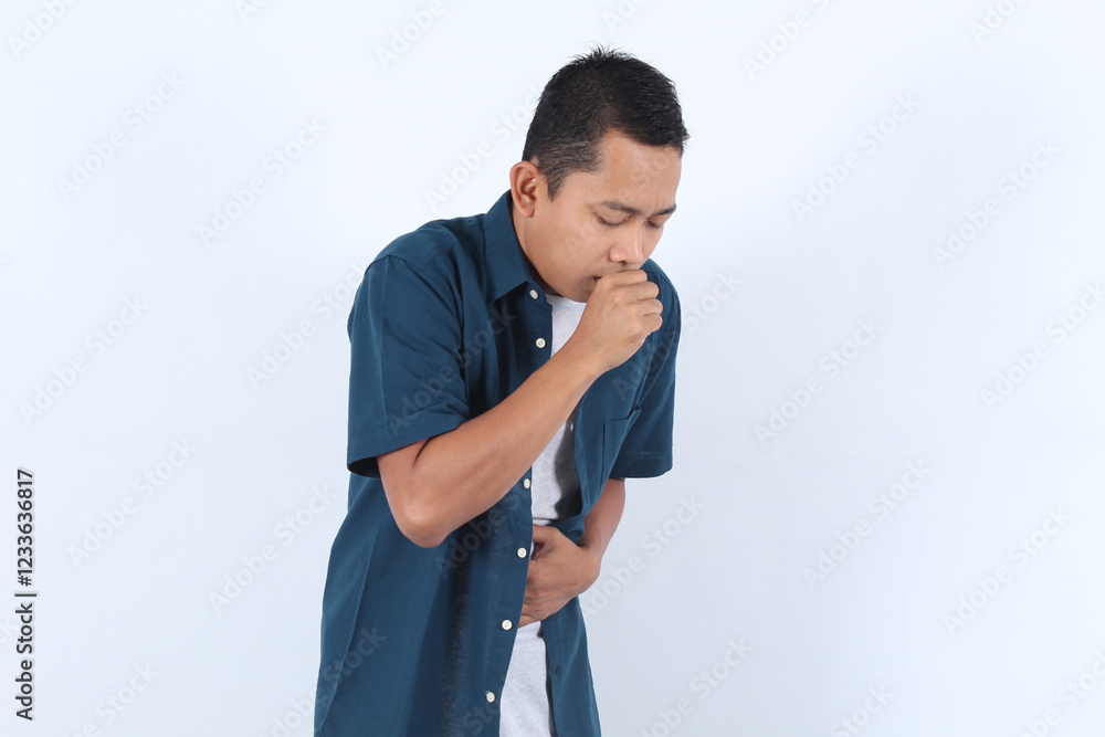 Adult Asian Man Coughs and Holds Stomach Experiencing Illness Symptoms on White Background Adult Asian Man Coughs and Holds Stomach Experiencing Illness Symptoms on White Background