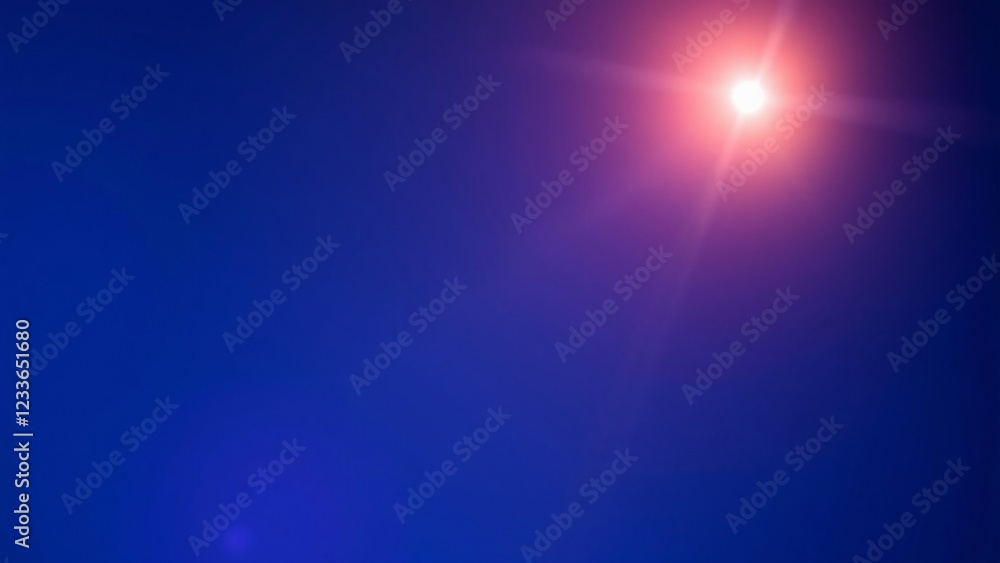 Bright Starburst on Deep Blue Sky - Lens Flare Overlay Bright Starburst on Deep Blue Sky - Lens Flare Overlay