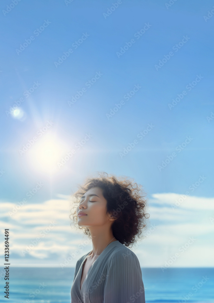 photo of woman praying with bluesky on the sea with blurred vision. photo of woman praying with bluesky on the sea with blurred vision.