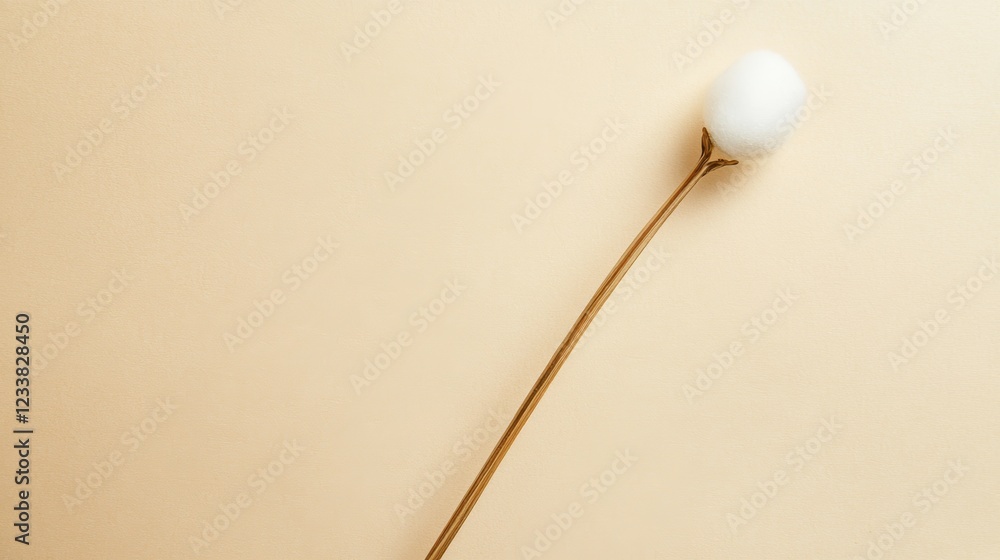 Elegant Minimalist Cotton Ball on Golden Stem Elegant Minimalist Cotton Ball on Golden Stem