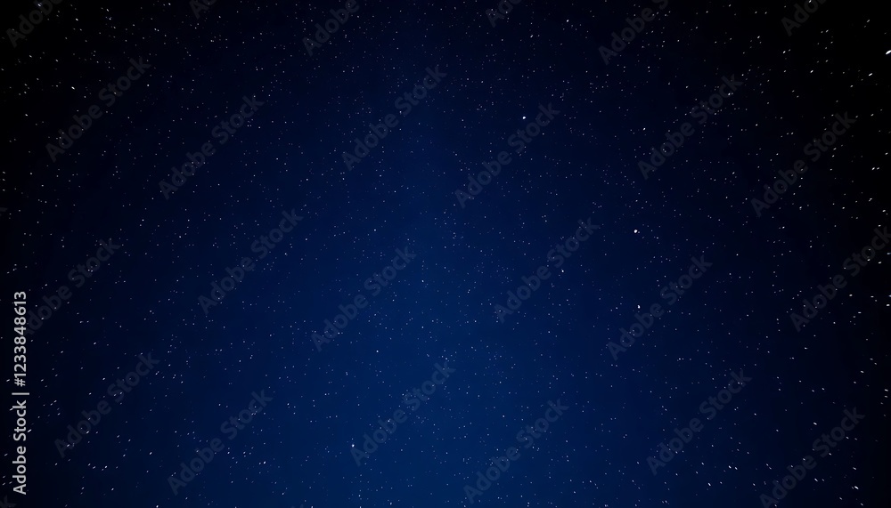 Fototapeta premium Night Sky: A Serene Celestial Canvas of Deep Blue and Sparkling Stars