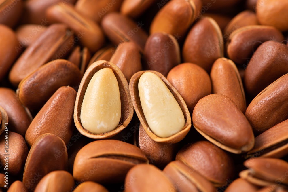 close up of roasted pine nuts background 