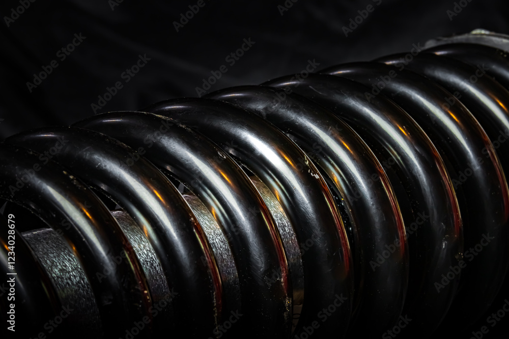 Close Up of Spring Coils with Warm Light Close Up of Spring Coils with Warm Light