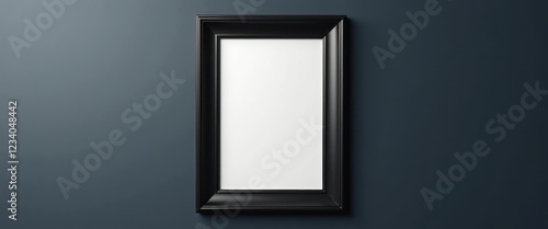 Rectangular Matte Black Mirror Against Dark Blue Wall: Starker Contrast Ima photo