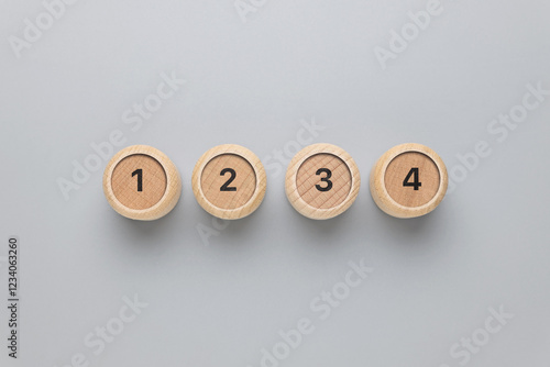 One, two, three, and four number on round wood blocks, step-by-step process, instructions, and procedure photo