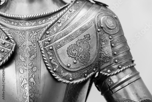 Tableau sur toile Detailed close-up of an ornate medieval armor with intricate engravings and metal rivets