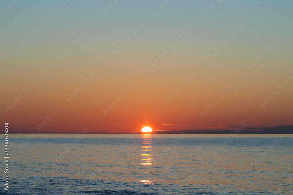 Fototapeta premium Sunset at sea, colorful skyline and ocean breeze, summer vacation and tropical paradise.