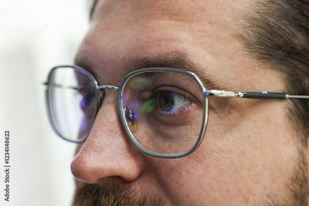 Man wearing stylish glasses on blurred background, closeup Man wearing stylish glasses on blurred background, closeup
