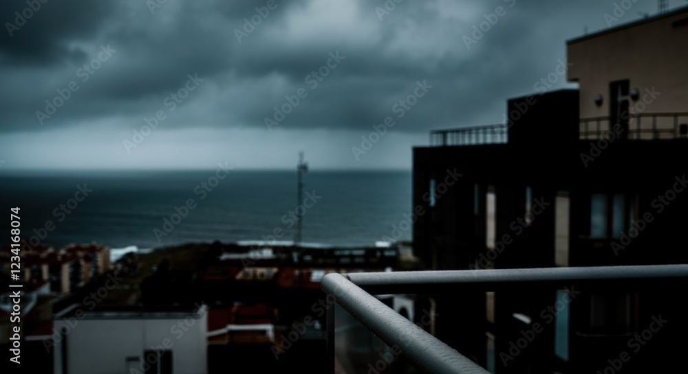 Stormy ocean view from city balcony with dark clouds looming Stormy ocean view from city balcony with dark clouds looming