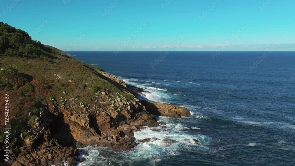 Calm Waves On The Rocky Shores Of Sorrizo In Arteixo, Spain. Aerial Drone Shot