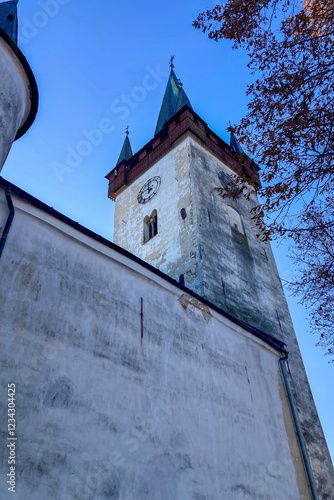 SLOVAKIA, SPISSKY STVRTOK - DECEMBER 29, 2024: Church of Saint Ladislaus is Roman Catholic church and national cultural monument in Spissky Stvrtok village, Slovakia photo